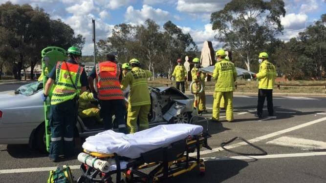 ACT Fire & Rescue and ACT paramedics at the scene of a two-vehicle crash on the corner of Brierly Street and Hindmarsh Drive, Weston. Picture: Supplied