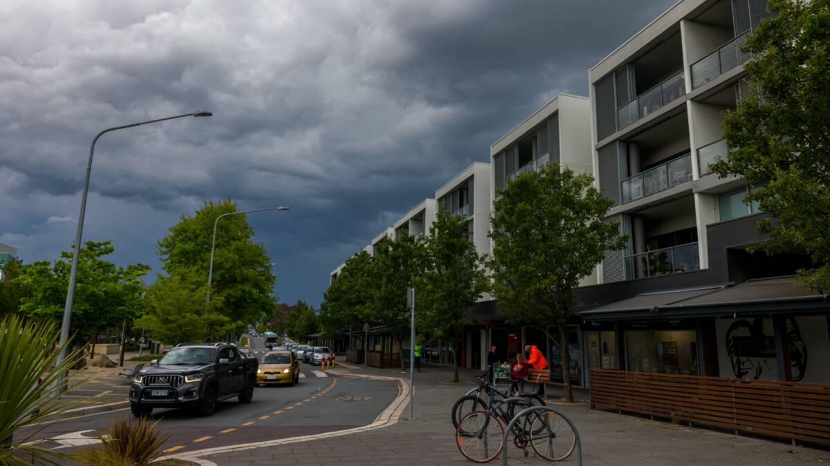 Rain clouds over Gungahlin on Monday afternoon. Picture by Sitthixay Ditthavong