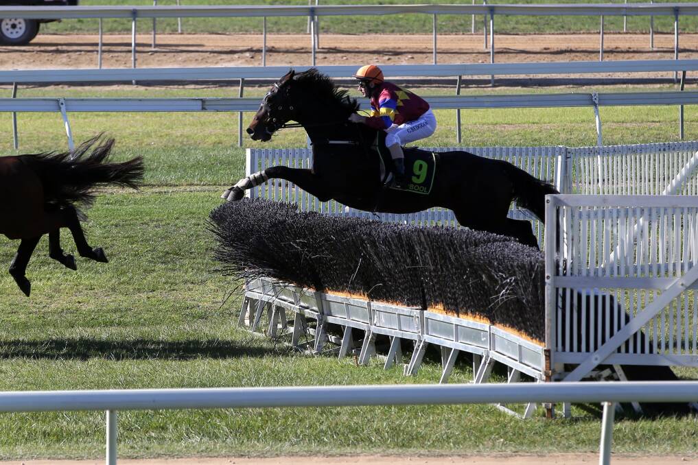 Glory Bound: Banna Strand clears a fence in the 2013 race.