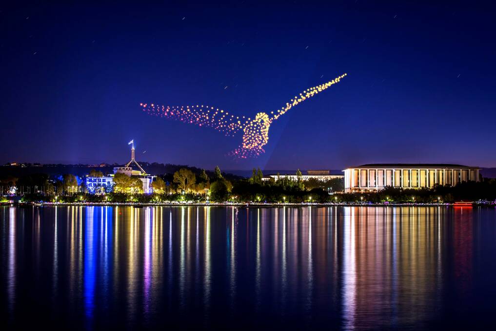 Using 600 drones, music and narration from a Ngunnawal person a story of Australia will be presented in the night sky over the lake. Rendered image by AGB Creative & IIIShutter