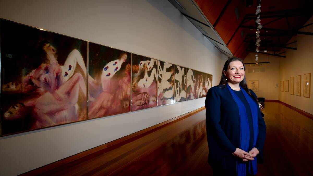 Canberra Museum and Gallery director Sarah Schmidt, unveils Sidney Nolan's Inferno, on loan from the Estate of Lady Nolan. Picture: Elesa Kurtz