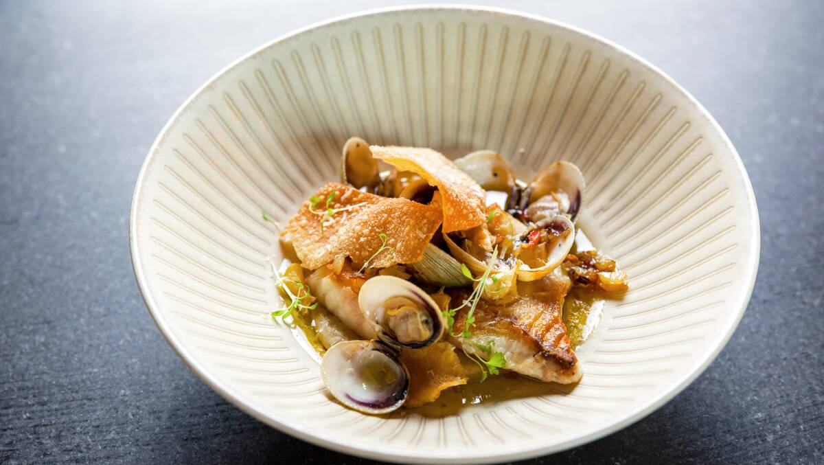Red snapper with Jerusalem artichoke, vongole, and garlic. Picture: Sitthixay Ditthavong
