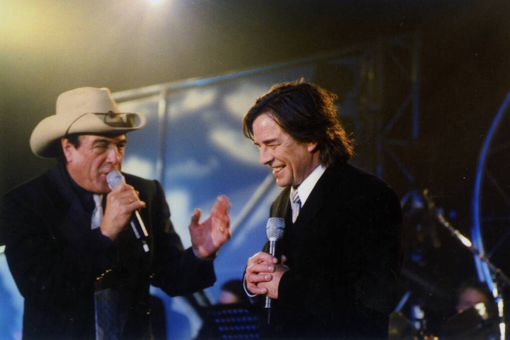 Molly Meldrum, from Countdown, with John Paul Young. Picture: Supplied