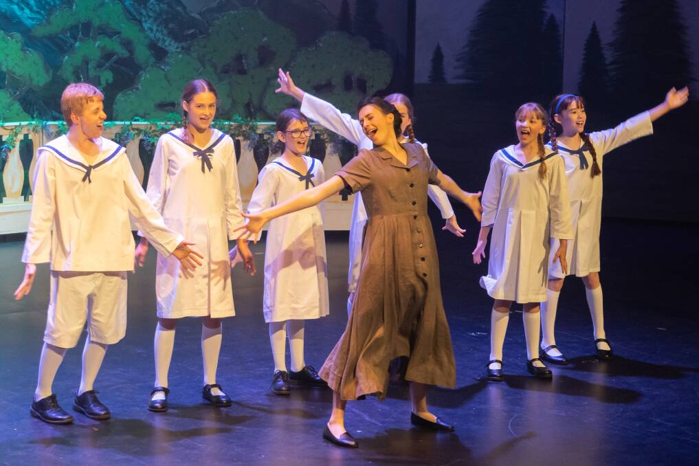 Queanbeyan Players' 2021 stage production of The Sound of Music features Lydia Milosavljevic as Maria, centre. Picture: Richard Thompson.