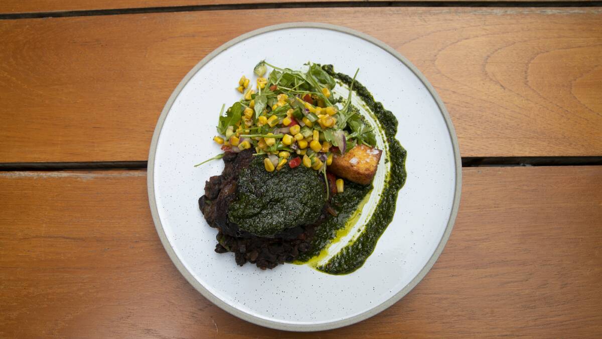 Chimichurri beef Cheeks with black beans and grilled corn polenta. Picture: Keegan Carroll