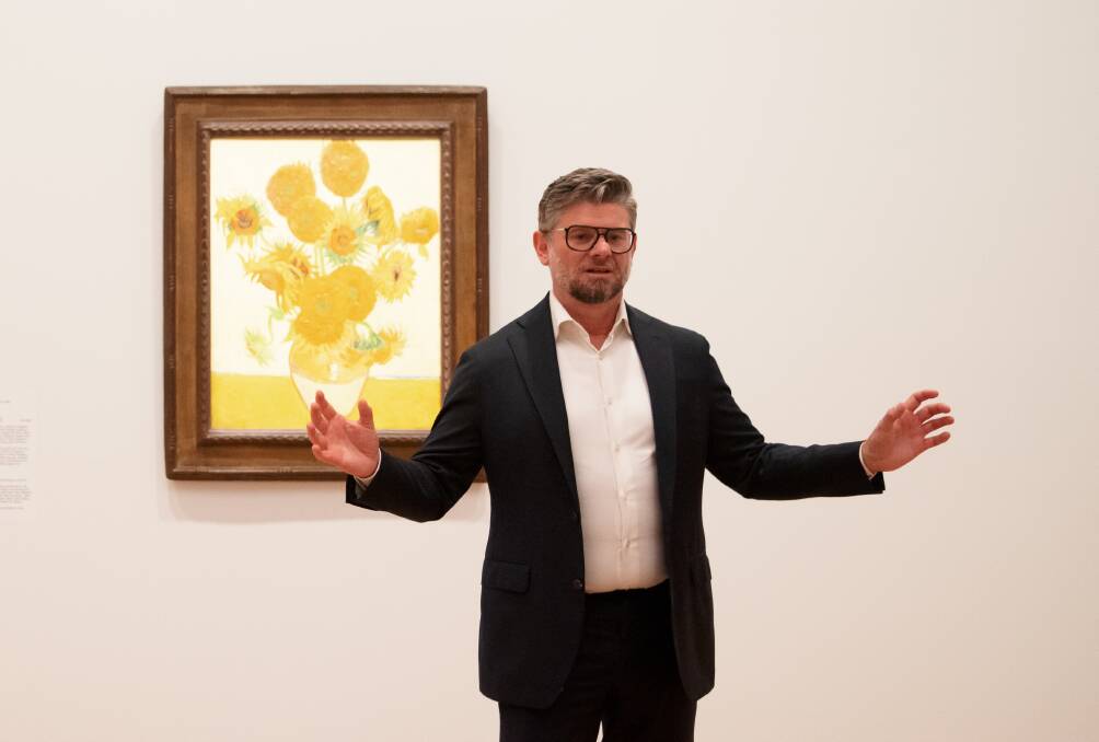 National Gallery of Australia director Nick Mitzevich with Van Gogh's Sunflowers. Picture: Sitthixay Ditthavong