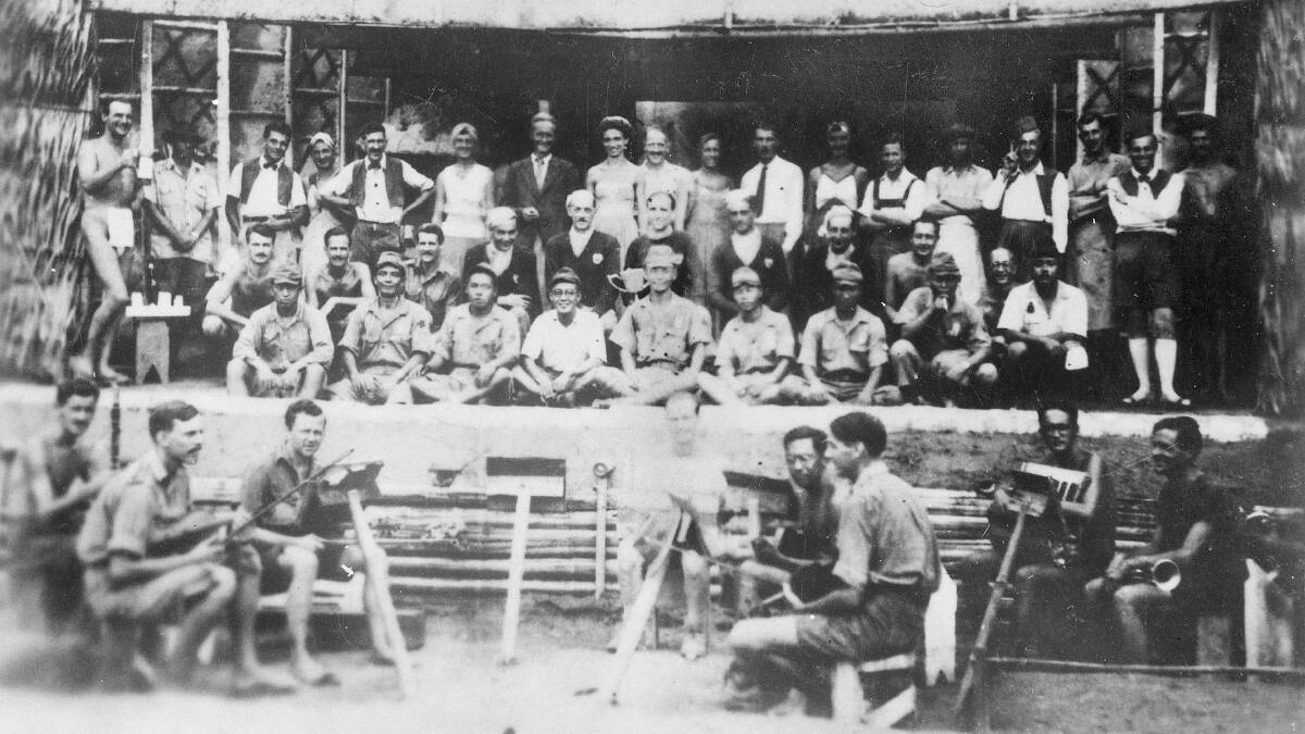 The cast and orchestra of a concert performed by Australian prisoners of war. Picture Australian War Memorial, P01433.011