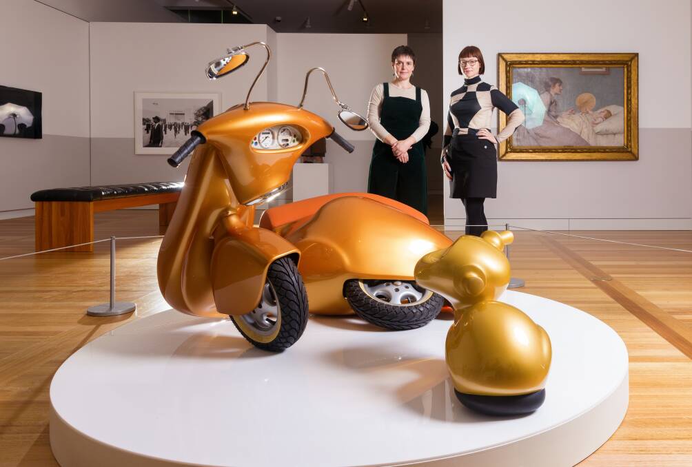 National Portrait Gallery curator Joanna Gilmour and National Gallery of Victoria curator Beckett Rozentals with Patricia Piccinini's work Nest. Picture by Sitthixay Ditthavong
