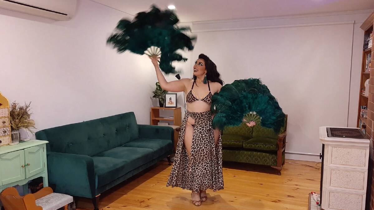 Burlesque dancer Sara Martini (Sara Elkholy) dancing in her living room during lockdown. Picture: Aisha