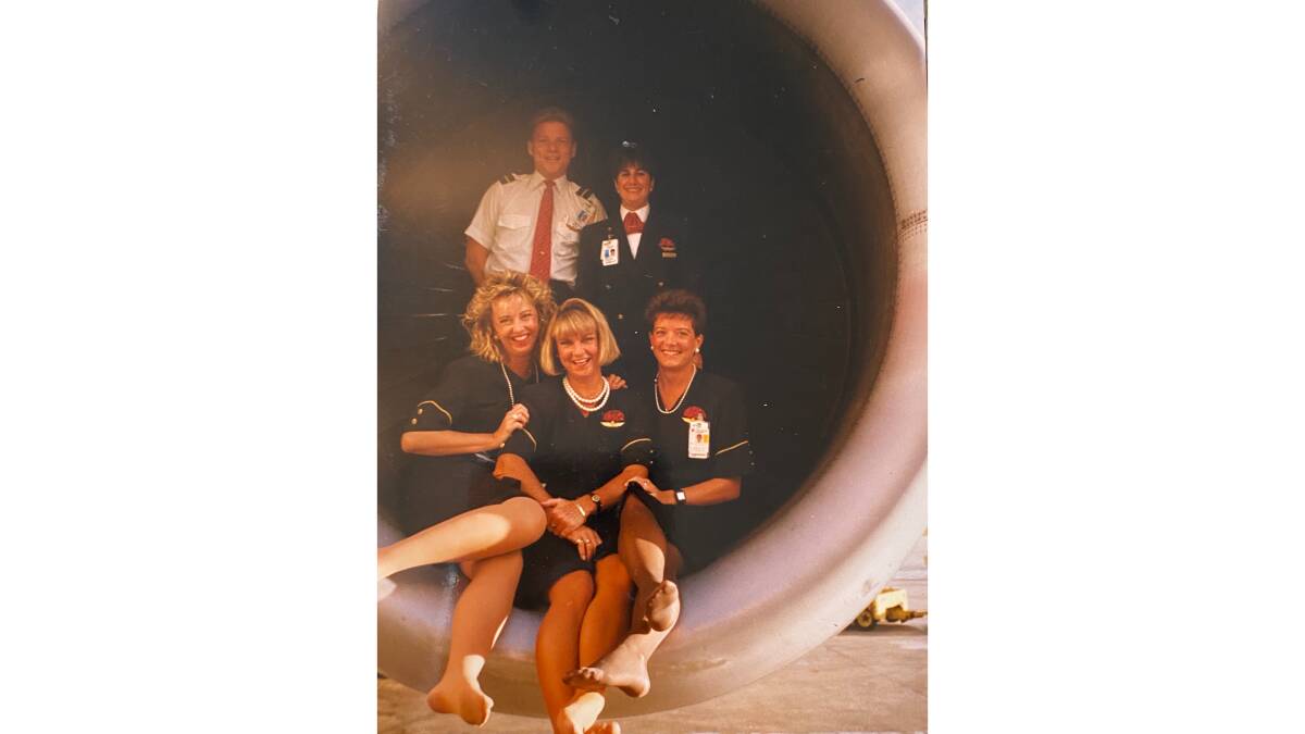 Marion Bradley, left, during her time as a flight attendant for Continental Airlines. Picture supplied