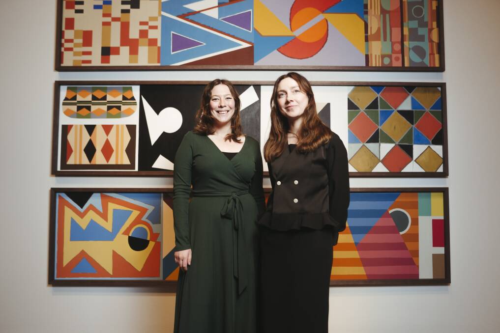 Assistant curator Yvette Dal Pozzo and curator Elspeth Pitt with newly acquired artwork from Diena Georgetti called Superstudio. Picture: Dion Georgopoulos