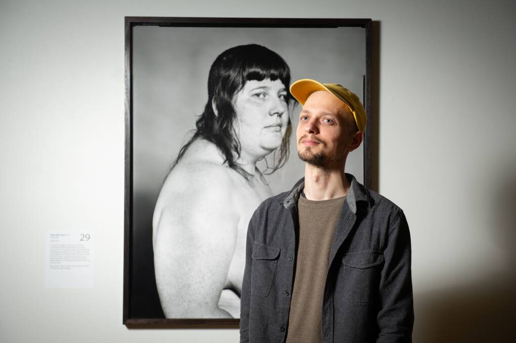 Winner of the National Photographic Portrait Prize, Shea Kirk, with his portrait titled Ruby (left view). Picture by Elesa Kurtz