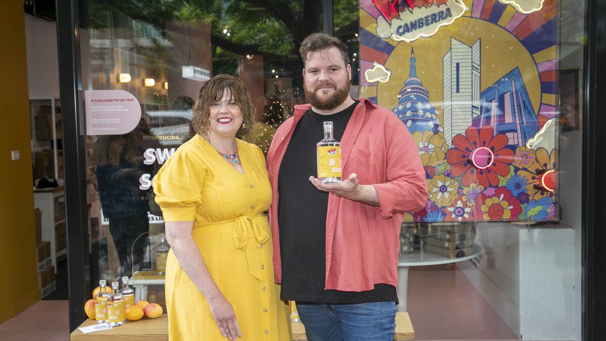 Underground Spirits' Claudia Roughley and Pop Canberra co-founder Gabe Trew at the launch of Sweet Sun Soaked Gin. Picture: Keegan Carroll