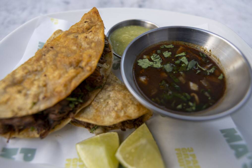 Beef birria tacos with consume. Picture by Gary Ramage