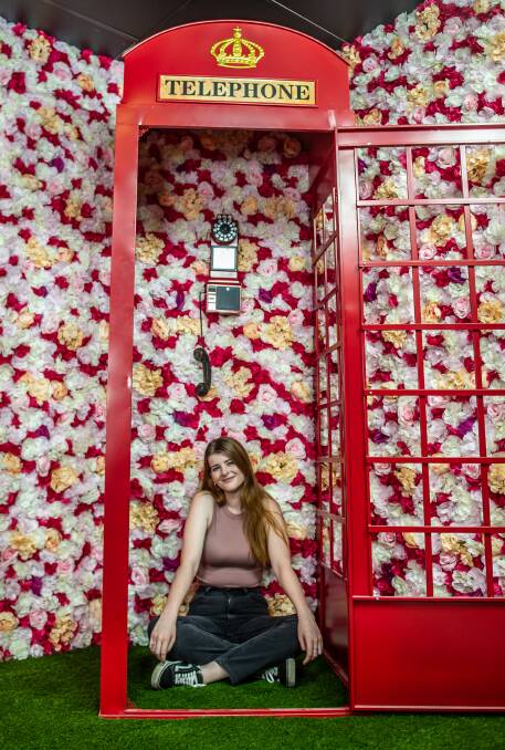 Niamh Collett tries out one of the Selfie Museum's installations. Picture: Karleen Minney
