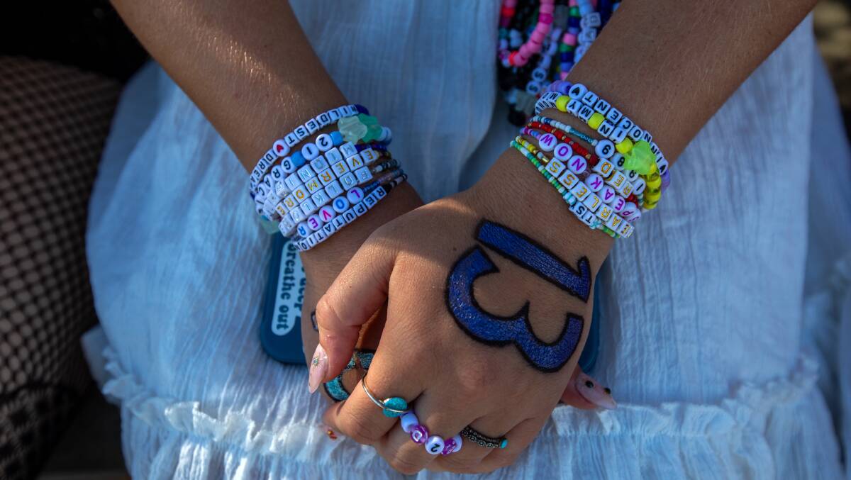 Swifites are set to have friendship bracelets on their wrist and a number 13 on their hand at The Eras Tour. Picture Getty Images/TAS Management