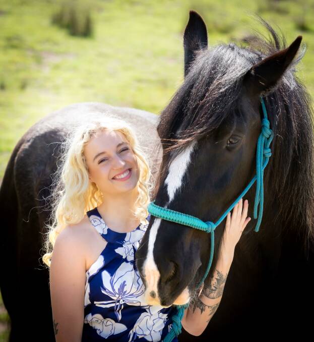 Maddison Braithwaite with Diesel, one of the Clydesdales that will be at the Cocktails and Clydesdales event. Picture: Holdfast Photography