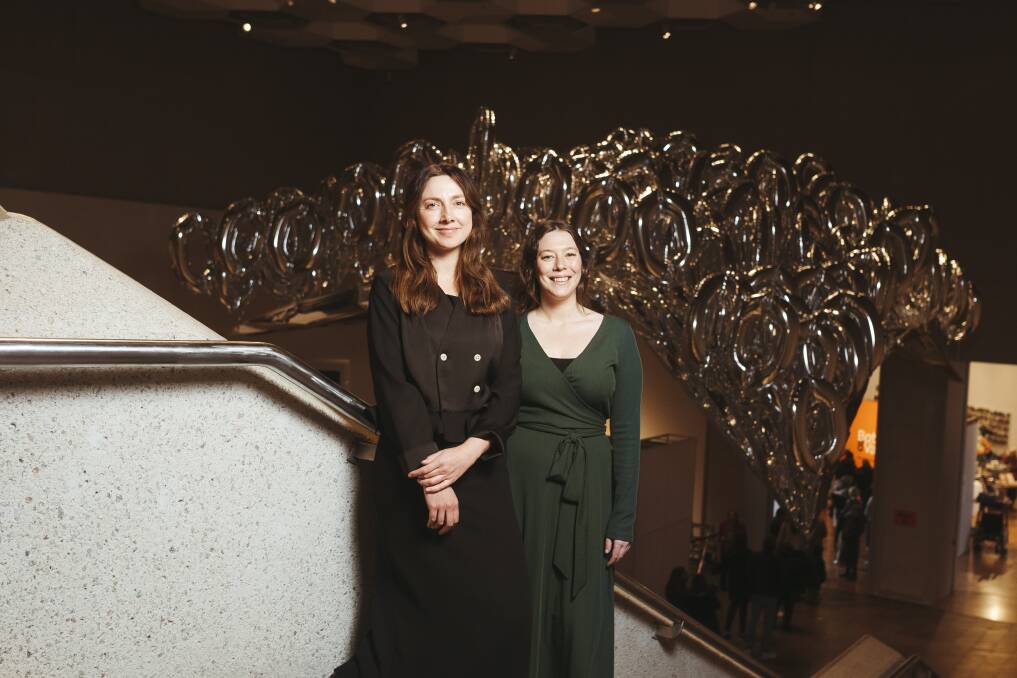 Curator Elspeth Pitt and assistant curator Yvette Dal Pozzo with the newly acquired artwork from Mikala Dwyer called The Silvering. Picture: Dion Georgopoulos