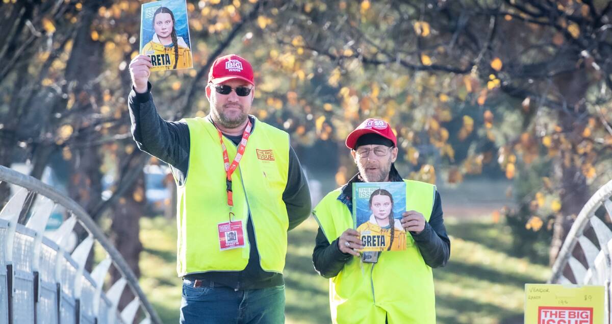The Big Issue vendors Grant and Randy ready to celebrate the magazines 25th anniversary. Picture: Karleen Minney
