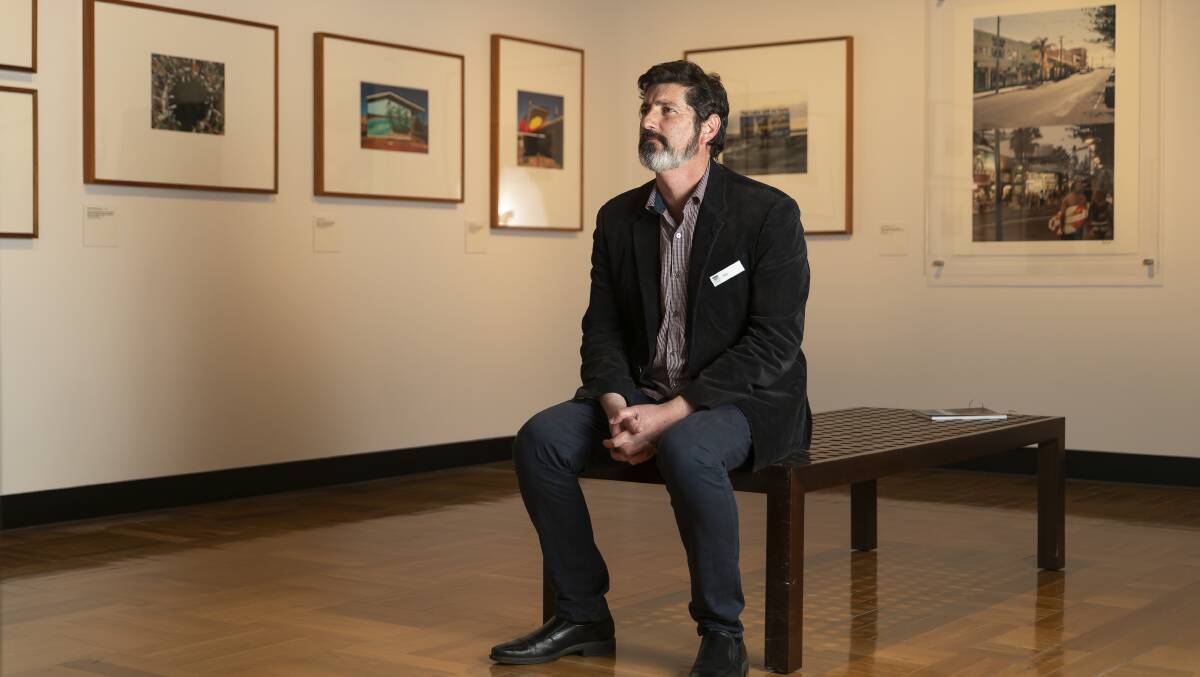 Exhibition curator Matthew Jones in the National Library of Australia's new exhibition, Viewfinder. Picture by Keegan Carroll