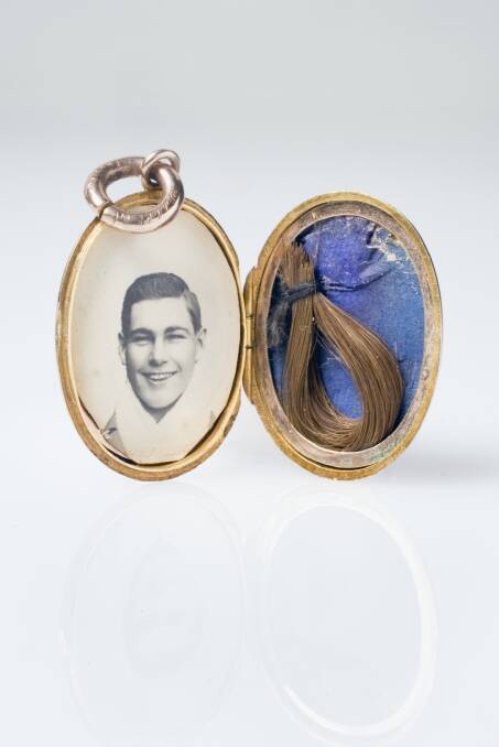 The mourning locket with a photo of Les Darcy and a lock of his hair. Picture: National Museum of Australia
