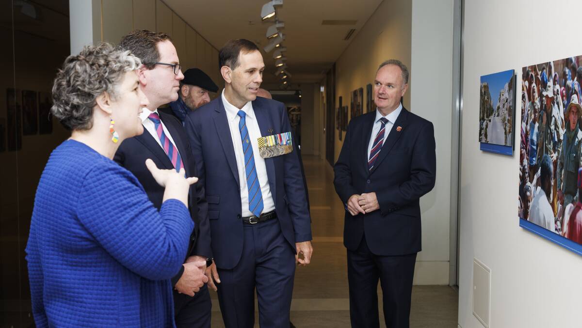 Australian War Memorial curator Emma White, Minister for Defence Personnel and Minister for Veterans' Affairs Minister Matt Keogh, Major Bob Worswick and Australian War Memorial director Matt Anderson. Picture by Keegan Carroll