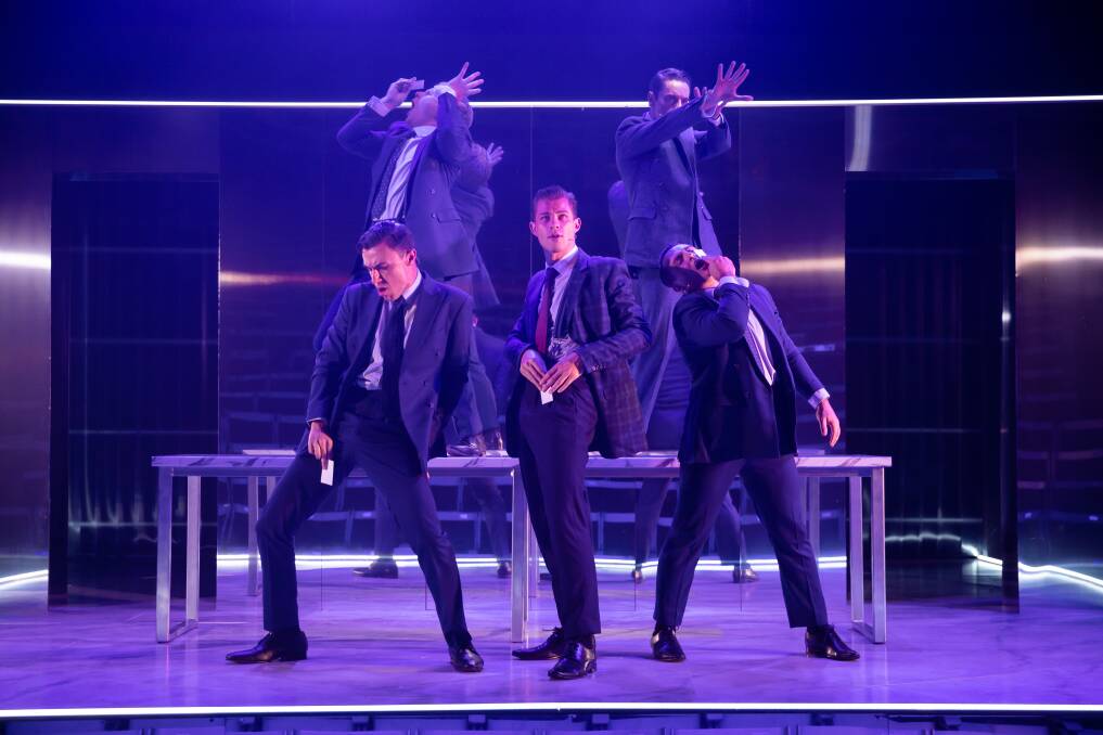 American Psycho -The Musical's take on the business card scene. Picture: Daniel Boud