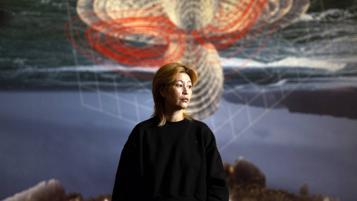 Artist Haegue Yang in her National Gallery exhibition, Changing From From to From. Picture by Gary Ramage
