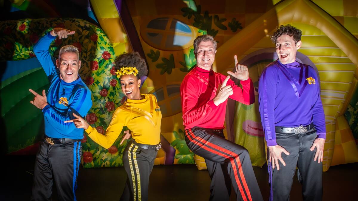 Blue Wiggle Anthony Field, yellow Wiggle Tsehay Hawkins, red Wiggle Simon Pryce and purple Wiggle Lachlan Gillespie at the Canberra Theatre Centre. Picture: Karleen Minney