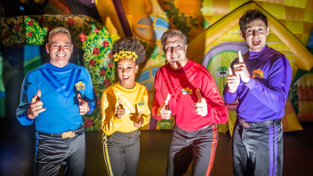 Blue Wiggle Anthony Field, yellow Wiggle Tsehay Hawkins, red Wiggle Simon Pryce and purple Wiggle Lachlan Gillespie at the Canberra Theatre Centre. Picture: Karleen Minney