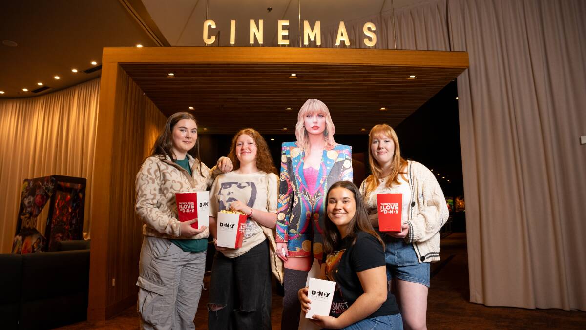 ANU Taylor Swift Society members Pearl O'Connor, Mikayla Simpson, Cate Hickman, and Mia Jaggers are gearing up for the release of Talyor Swift's concert film. Picture by Sitthixay Ditthavong