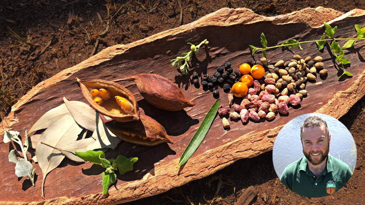 Adam Shipp and a coolamon filled with edible Indigenous nuts, seeds and fruits. Picture: Supplied