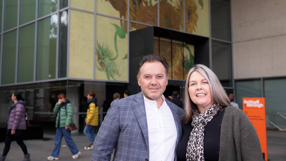 Canberra's Richard Cabrita and Kim Bryant visited the blockbuster on its final day. Picture: Sitthixay Ditthavong