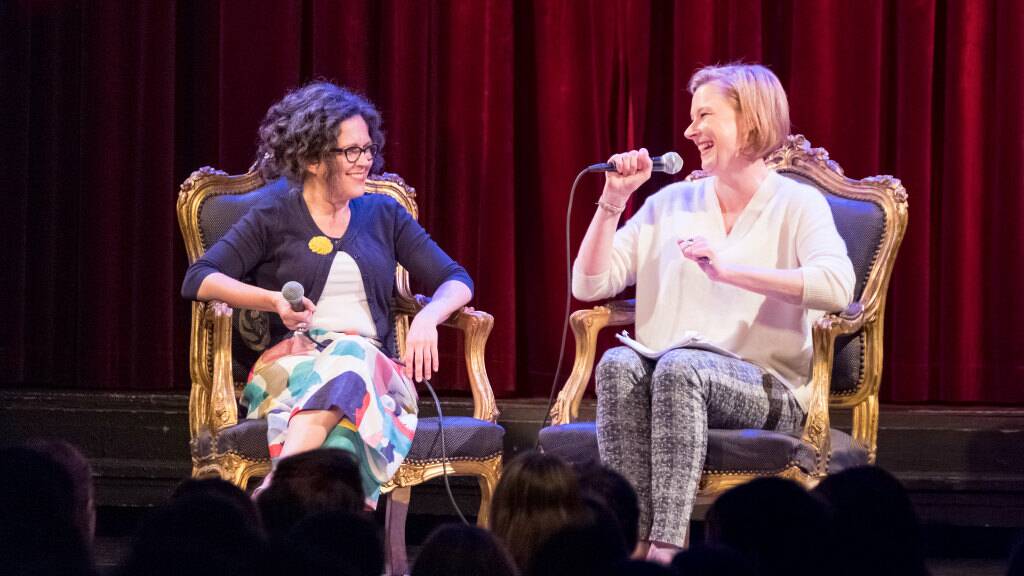 Annabel Crabb and Leigh Sales during one of their sell-out live shows in Canberra. Picture: Graham Tidy