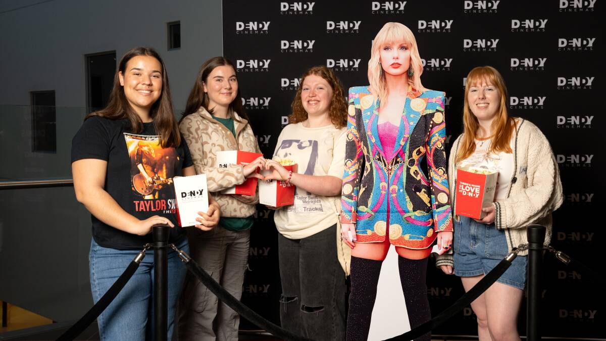ANU Taylor Swift Society members Cate Hickman, Pearl O'Connor, Mikayla Simpson, and Mia Jaggers are gearing up for the release of Talyor Swift's concert film. Picture by Sitthixay Ditthavong