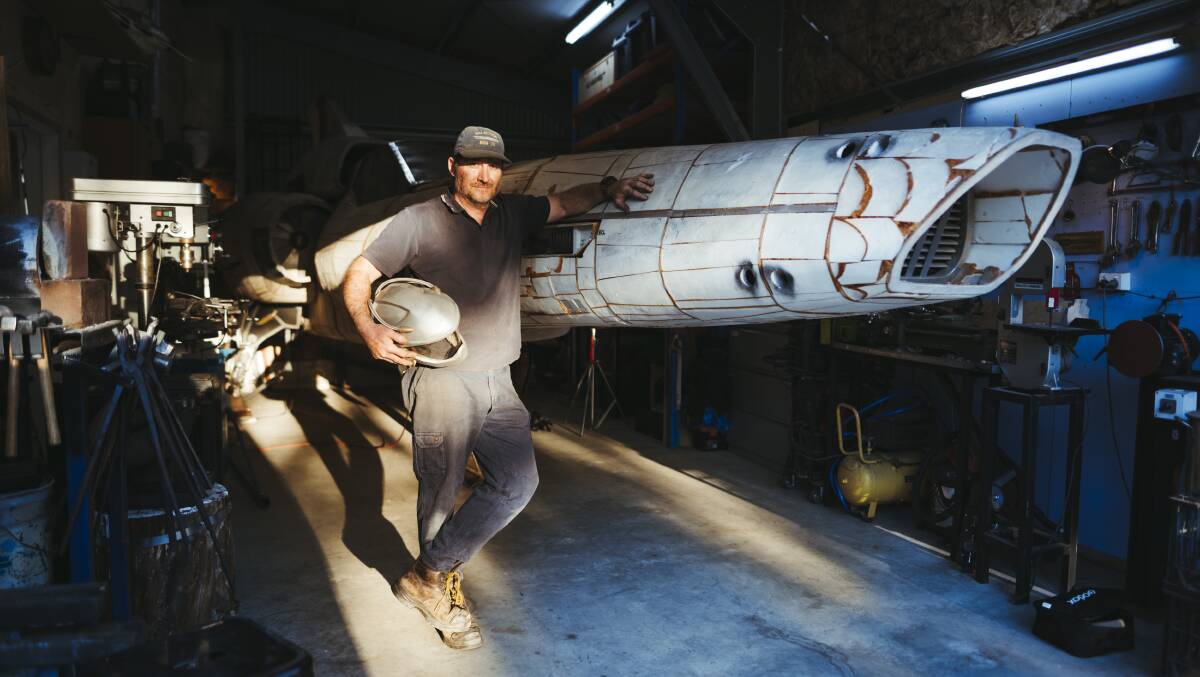 Canberra resident Baz has spent the last few years recreating an interactive, full sized model of MK II Colonial Viper spaceship from Battlestar Galactica. Picture: Dion Georgopoulos 