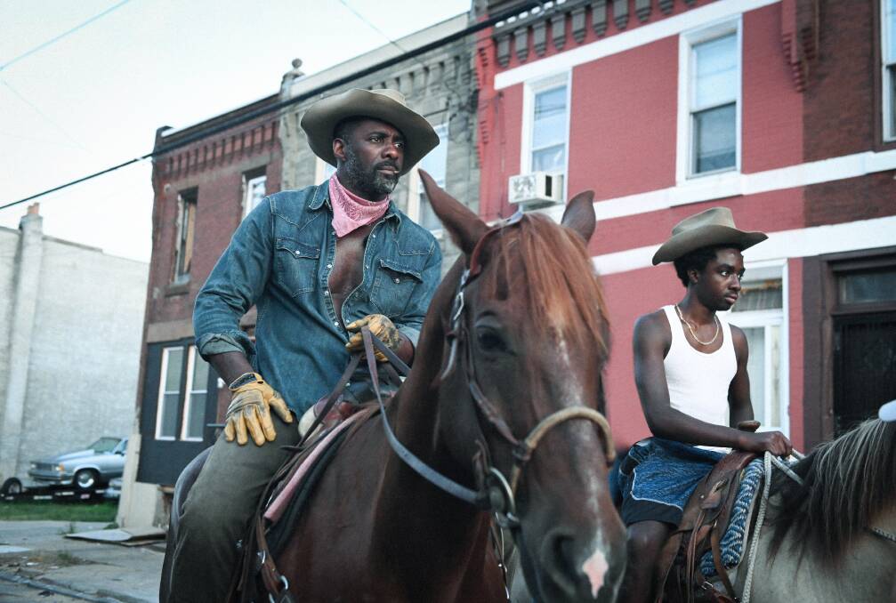 Idris Elba as Harp and Caleb McLaughlin as Cole in Concrete Cowboy. Picture: Netflix