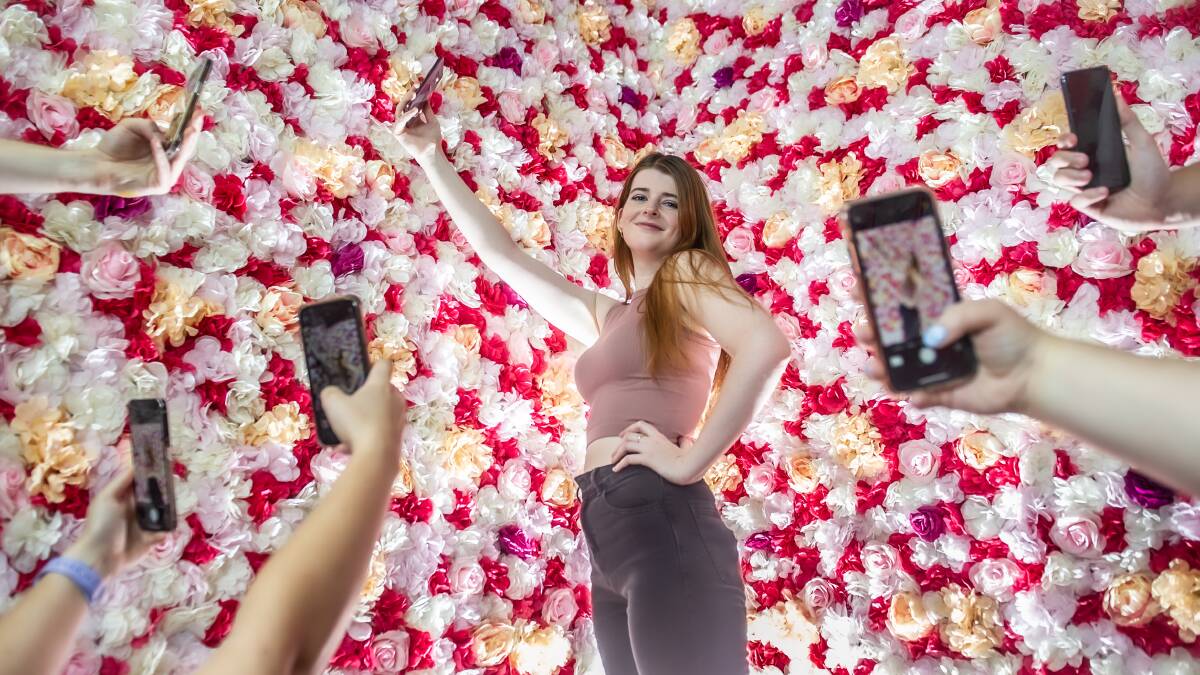 Niamh Collett tries out one of the Selfie Museum's installations. Picture: Karleen Minney