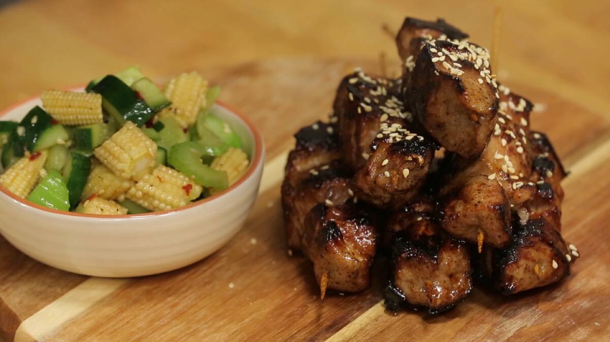 Honey soy pork skewers with salad. Picture: Supplied