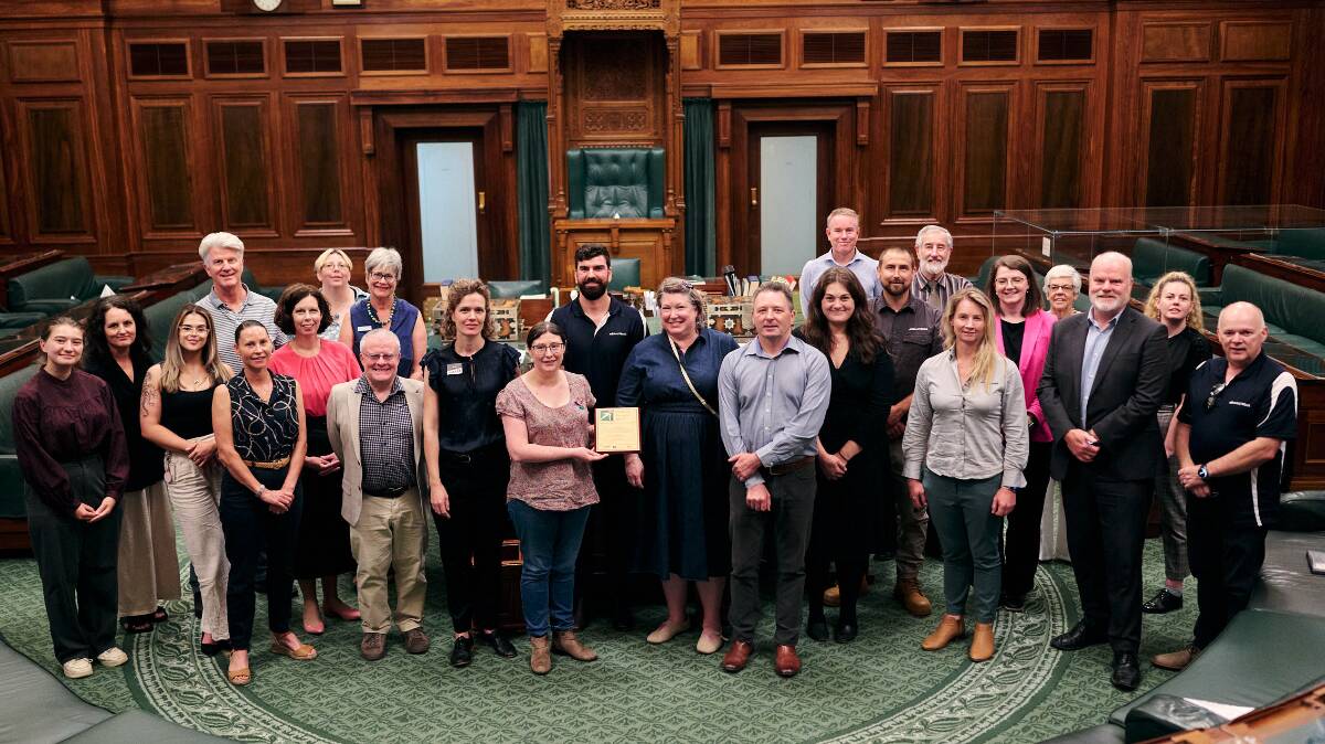 Museum of Australian Democracy staff and project partners from the Old Parliament House Fire Remediation Project team are presented with a 2023 National Trust (ACT) heritage award. Picture supplied