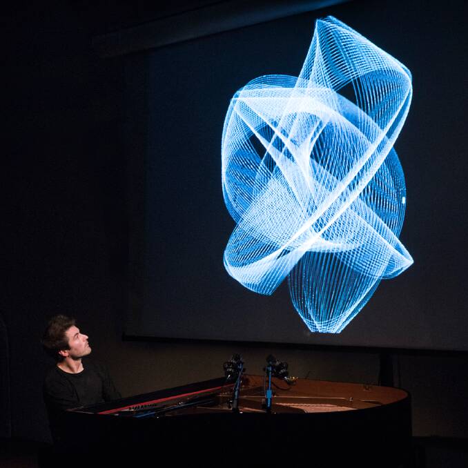 Both the piano and visualisation coding react in real-time. Picture by Nicolas Joubard 