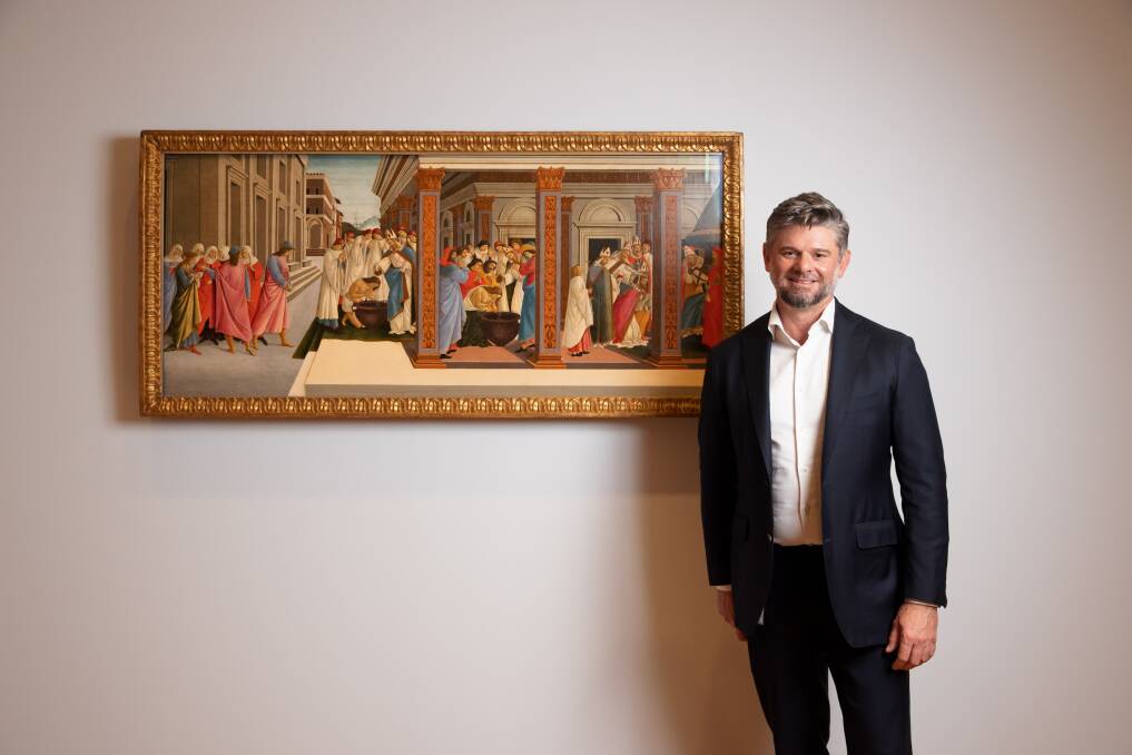 National Gallery of Australia director Nick Mitzevich with Sandro Botticelli's Four scenes from the early life of Saint Zenobius c 1500. Picture: Sitthixay Ditthavong