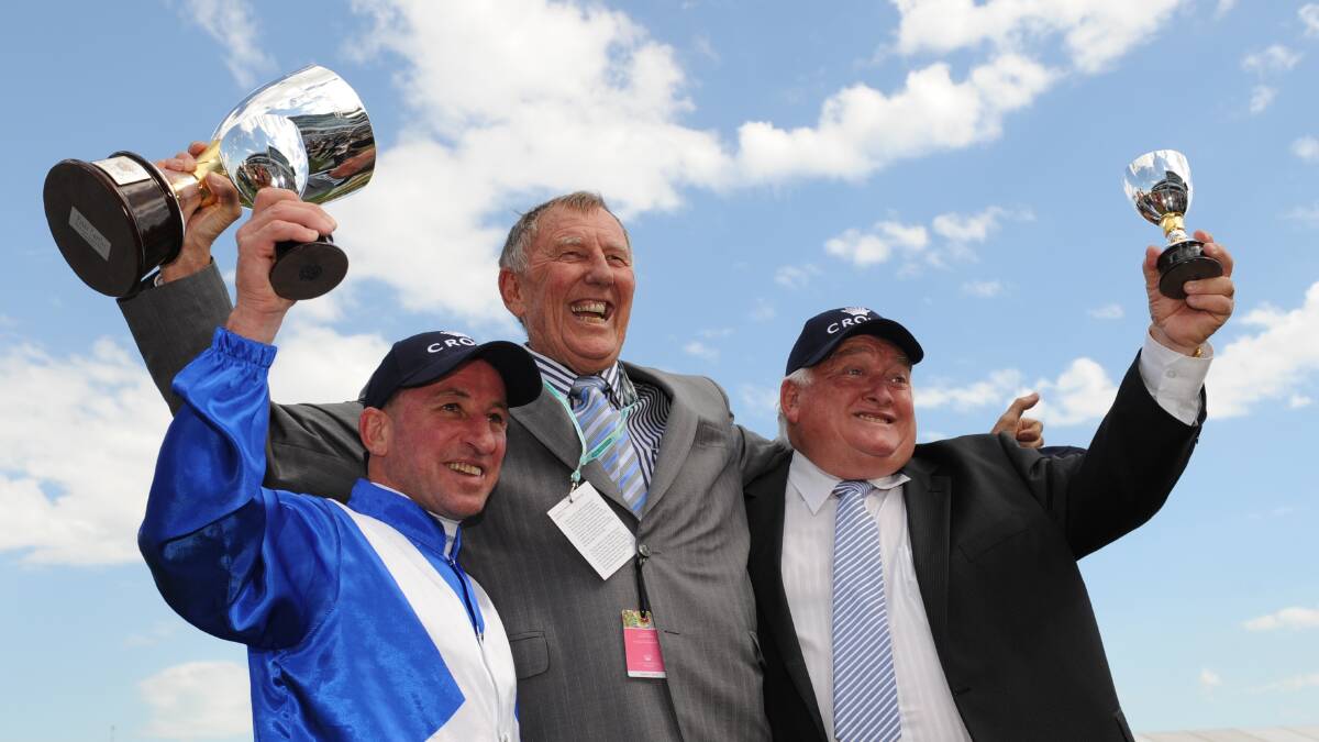 Clarry Connors, right, is still teaming up with owner John Singleton, centre. Picture AAP