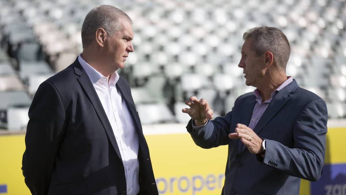 Brumbies boss Phil Thomson, left, with Raiders chief executive Don Furner. Picture by Sitthixay Ditthavong