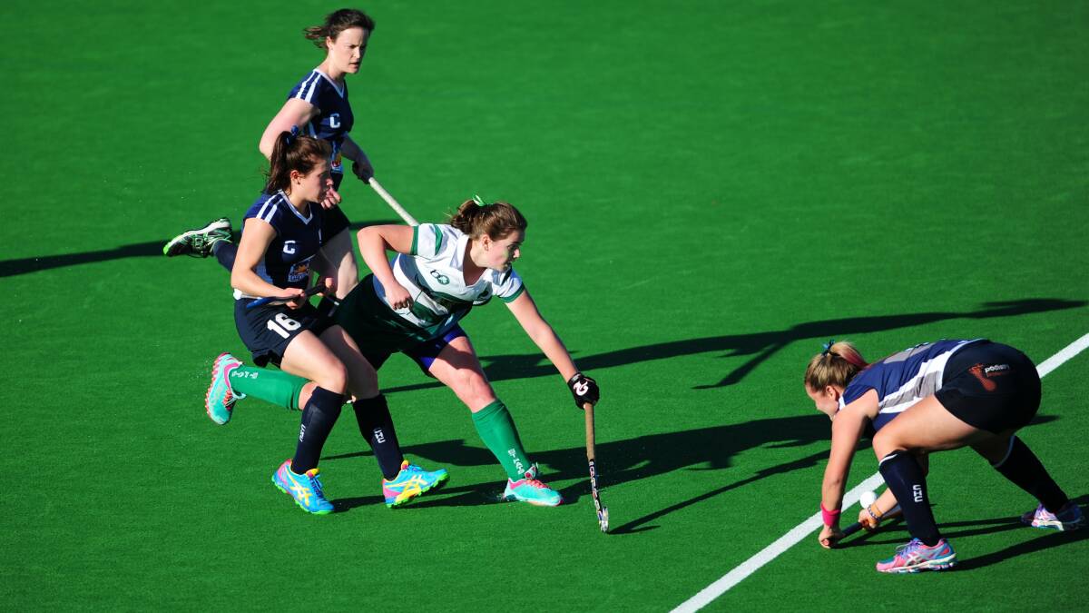 Laura Reid, centre, playing for St Patrick's in 2014. Picture by Melissa Adams
