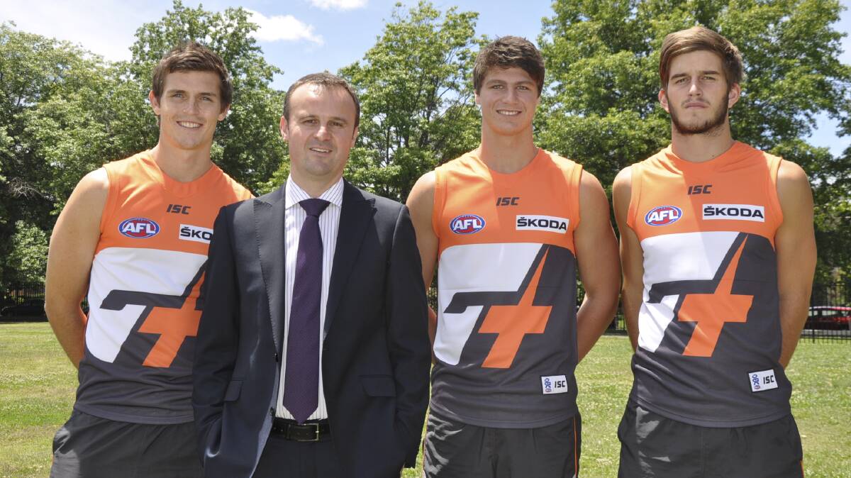 ACT Chief Minister Andrew Barr with the Giants in 2011. It was estimated having Canberra on the Giants' jersey in their AFL grand final appearance was worth $1 million in exposure. Picture: Supplied