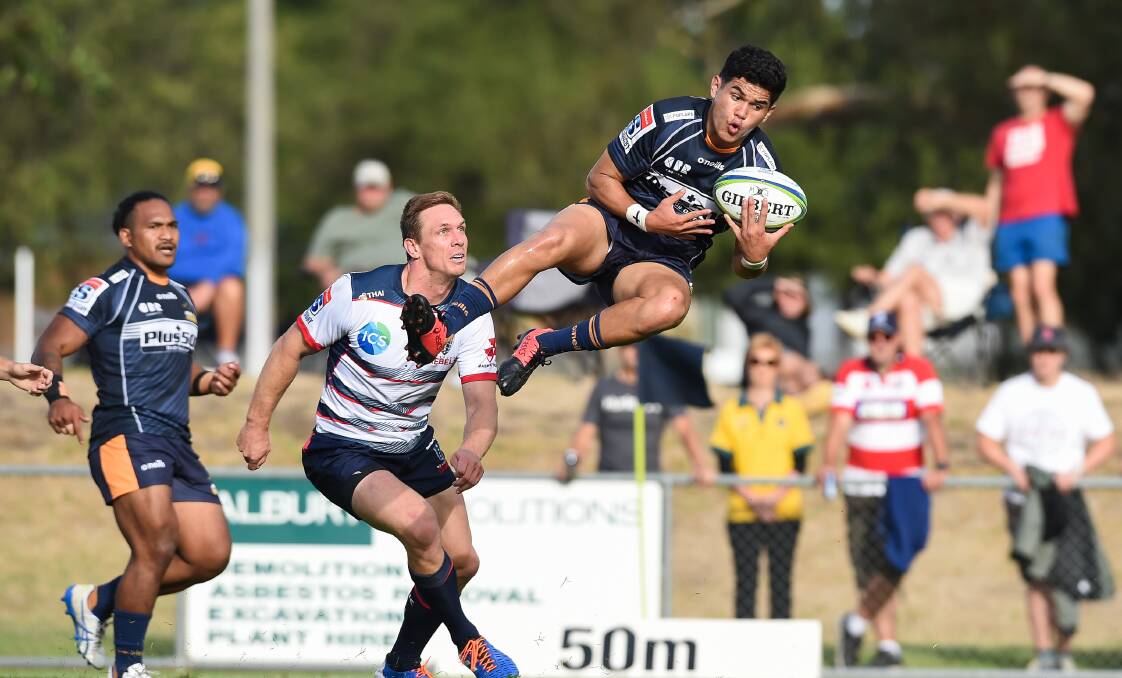 Noah Lolesio leaps high against the Rebels. Picture: Mark Jesser