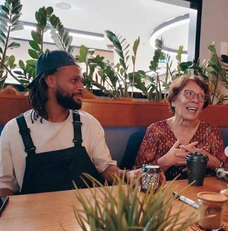 Patty Mills and mum Yvonne share a coffee earlier this year. The NBA guard has started a initiative to raise money on Mother's Day. Picture: Supplied