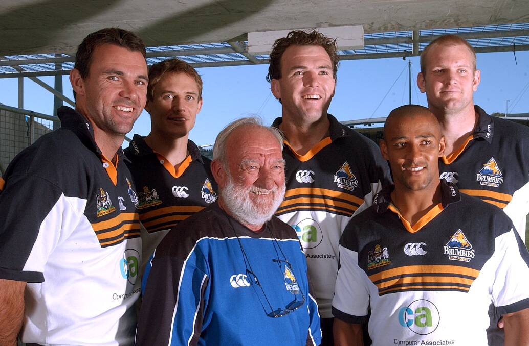 Joe Roff, Stephen Larkham, Owen Finegan, George Gregan and David Giffin with Garry Quinlivan, front, who has worked for the Brumbies since 1996. Picture: Gary Schafer
