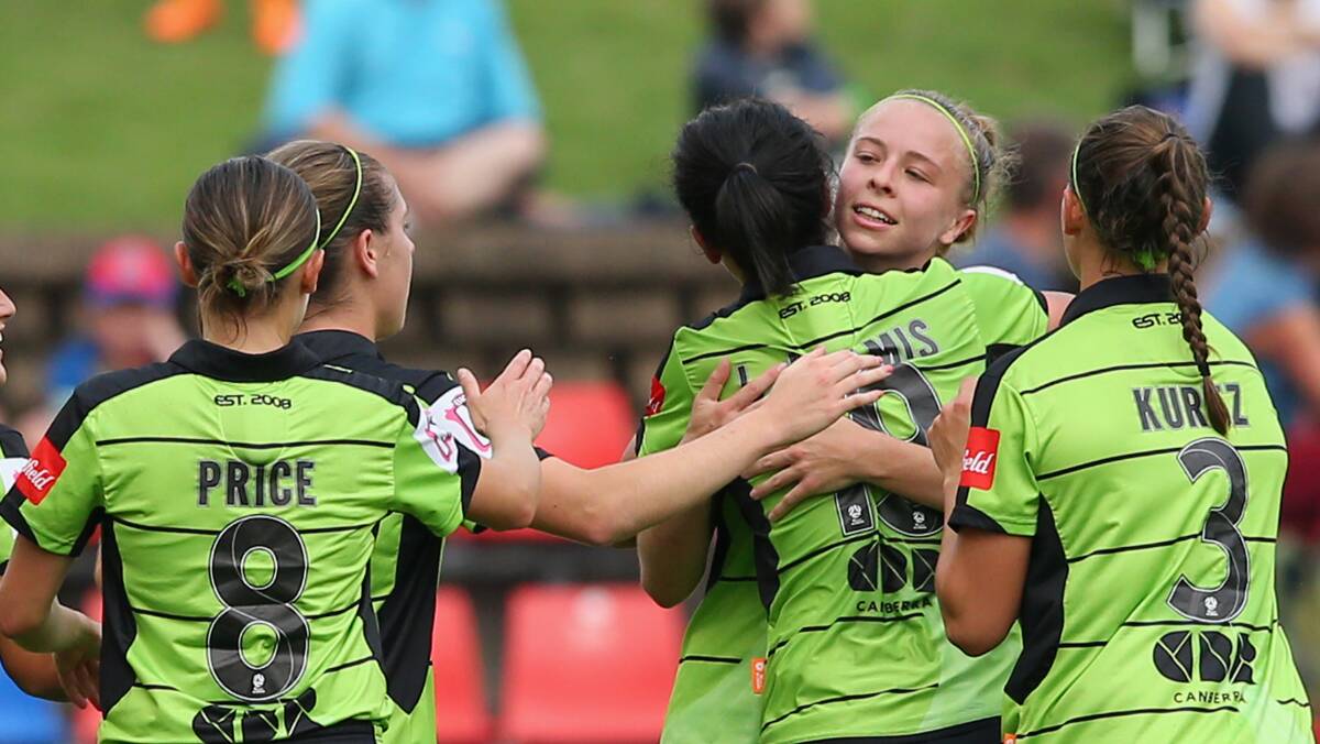 Canberra United celebrate Ashlie Croft's, centre, first W-League goal. Picture: Getty Images